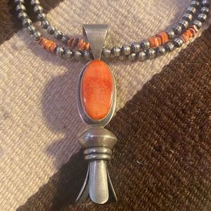 Spiny oyster and sterling silver pendant . Brand new .NWOT .